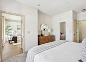 Thumbnail 10 of 32 - Spacious bedroom with natural light and neutral decor in Tattersall Village Apartments, Hinesville, GA