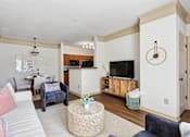 Thumbnail 7 of 32 - Bright and spacious living room at Tattersall Village Apartments in Hinesville, GA, near Fort Stewart and Savannah