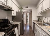 Thumbnail 4 of 20 - The Jaunt Apartments in Charleston South Carolina photo of kitchen with white cabinets