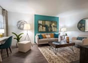 Thumbnail 2 of 20 - The Jaunt Apartments in Charleston South Carolina photo of  a living room with a couch and a table