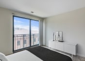 Thumbnail 6 of 29 - bedroom with balcony