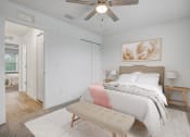 Thumbnail 6 of 19 - Apartments for Rent in Jacksonville, FL – The Marley at Trout River - bedroom with a bed and a ceiling fan