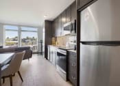 Thumbnail 8 of 50 - kitchens equipped with stainless steel appliances and dark cabinets