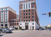 Thumbnail 4 of 27 - a view of a building on the corner of a city street