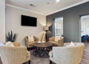 Thumbnail 22 of 29 - Sage at 1240 apartments in Mount Pleasant South Carolina photo of clubhouse seating area with tv