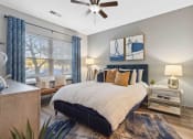 Thumbnail 5 of 29 - Sage at 1240 apartments in Mount Pleasant South Carolina photo of bedroom with hardwood flooring and ceiling fan