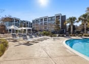 Thumbnail 13 of 29 - Sage at 1240 apartments in Mount Pleasant South Carolina photo of sundeck by pool