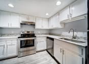 Thumbnail 1 of 19 - The Trails of North Hills apartments in Raleigh, NC photo of upgraded kitchen