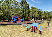Thumbnail 4 of 24 - Opelika, AL Apartments – The Crossings of Opelika - our apartments showcase a playground