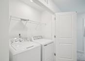 Thumbnail 14 of 20 - In-home washer and dryer at The Maple pet-friendly townhomes Raleigh NC