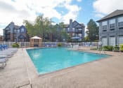 Thumbnail 2 of 11 - Apartments in Glendale Heights for rent - The Mark -  our apartments offer a swimming pool and large sundeck with lounge chairs
