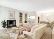 Thumbnail 2 of 16 - Affinitee at Stone Mountain Apartments photo of a living room with a couch and a fireplace