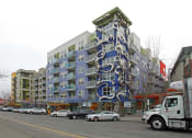 Thumbnail 8 of 28 - Fremont, WA Apartments for Rent - Epicenter - Building Exterior with Private Patios/Balconies, Street Access, Street Parking
