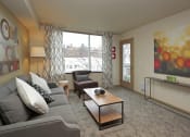 Thumbnail 3 of 28 - living room with access to private balcony
