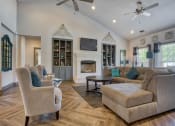 Thumbnail 19 of 25 - Apartments in Clarksville, TN for Rent - Parc at Clarksville - Clubhouse with vaulted ceilings and ceiling fan