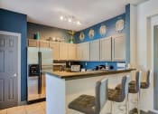 Thumbnail 22 of 25 - Apartments in Clarksville, TN for Rent - Parc at Clarksville - Clubhouse Kitchen with Stainless Steel Appliances