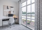 Thumbnail 4 of 17 - Resident business center with workspace at Townes at Clarkston Centre apartments near Decatur