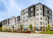 Thumbnail 17 of 17 - Exterior of Townes at Clarkston Centre apartments in Clarkston, GA, offering pet-friendly 1, 2 and 3 bedroom apartment homes.