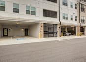 Thumbnail 14 of 17 - Resident parking garage at Townes at Clarkston Centre apartments in Clarkston, GA.