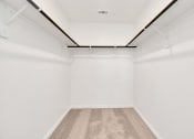 Thumbnail 35 of 39 - an empty room with white walls and carpet