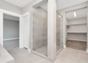 Thumbnail 23 of 34 - a large walk in shower with tiled walls and floors