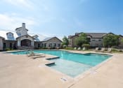 Thumbnail 13 of 21 - the preserve at ballantyne commons pool and apartment buildings