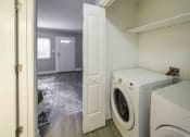 Thumbnail 15 of 19 - The Trails of North Hills apartments in Raleigh, NC photo of washer & dryer in unit.