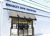 Thumbnail 22 of 25 - The entrance to the Broken Bow Brewery is shown.