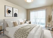 Thumbnail 6 of 15 - a bedroom with a large bed and a window