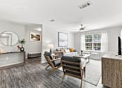 Thumbnail 7 of 28 - Open-concept living and dining area in a Hattiesburg apartment near Oak Grove
