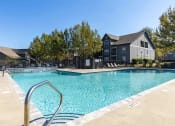 Thumbnail 4 of 29 - Twin Oaks Apartments in Hattiesburg Mississippi photo of our apartments showcase a swimming pool