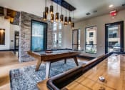 Thumbnail 15 of 18 - Grand Prairie TX Apartments for Rent-Spacious Game Room With Stylish Features and Billiards Table