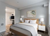 Thumbnail 25 of 42 - a bedroom with a large bed and a closet in a 555 waverly unit