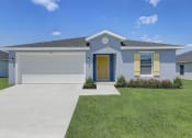 Thumbnail 1 of 29 - Lady Lake, FL Rentals – The Groves at Lake Ella - a blue house with a garage door and a lawn
