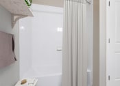 Thumbnail 8 of 20 - bathroom with tub shower