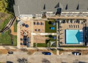 Thumbnail 39 of 40 - arial view of a house with a swimming pool and lawn