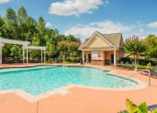 Thumbnail 12 of 27 - Villas at Hannover Apartments in Stockbridge, GA photo of resort style pool with sundeck