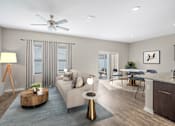 Thumbnail 17 of 63 - A modern living room with a grey sofa, a wooden coffee table, and a ceiling fan.