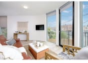 Thumbnail 18 of 54 - Living room windows with city views