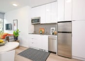 Thumbnail 1 of 54 - Kitchen with white cabinets