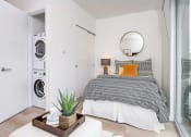 Thumbnail 7 of 54 - Bedroom and washer and dryer