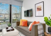Thumbnail 5 of 54 - Living room with large windows
