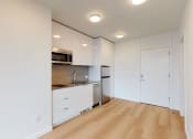 Thumbnail 34 of 54 - Kitchen with wood-style flooring