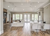 Thumbnail 23 of 33 - Club house with a tv and ceiling light and couches and chairs