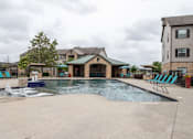 Thumbnail 27 of 33 - swimming pool surrounded by beach chairs