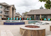 Thumbnail 29 of 33 - swimming pool surrounded by beach chairs and fire pit