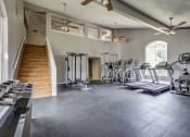 Thumbnail 25 of 29 - Westchase Apartments in Harvey LA photo of fitness center with cardio equipment