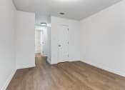 Thumbnail 7 of 33 - Whitney Manor Apartments in Gretna, LA photo of  bedroom with hardwood flooring
