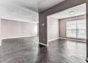 Thumbnail 13 of 33 - Whitney Manor Apartments in Gretna, LA photo of  living room and sunroom with hardwood flooring