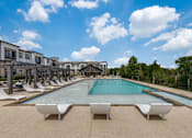 Thumbnail 2 of 25 - Resort-style pool at Georgetown TX apartments near Round Rock and Wolf Ranch Town Center